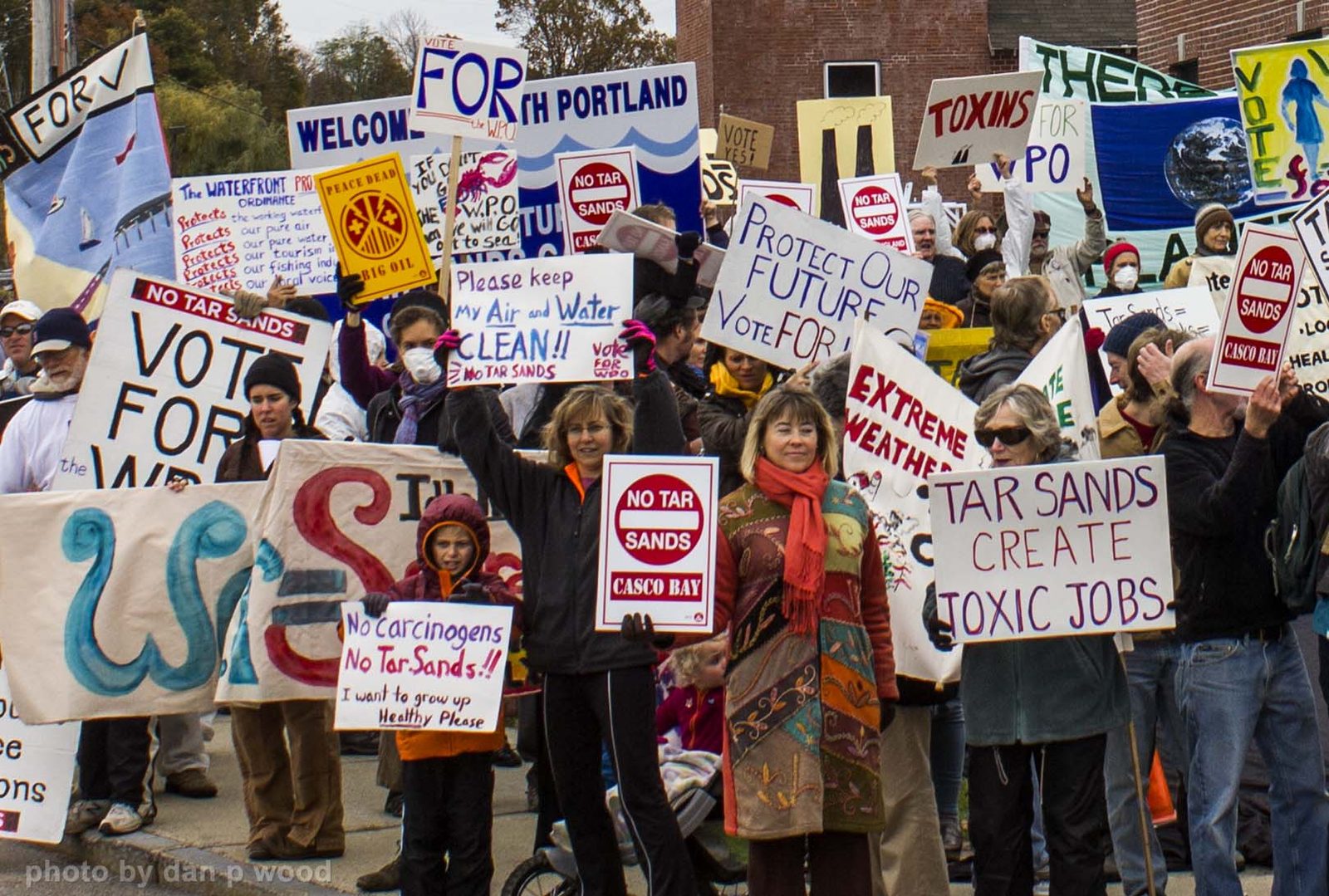 South Portland residents marching and rallying in favor of the Clear Skies Ordinance